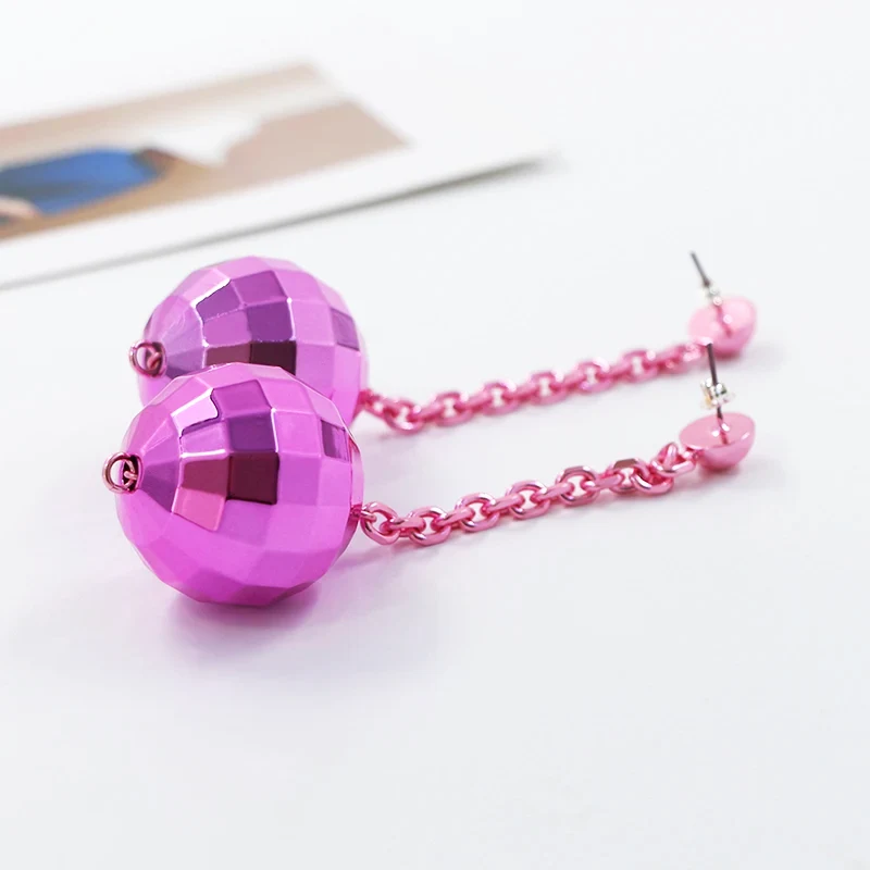 Boucles d'oreilles en plastique disco
