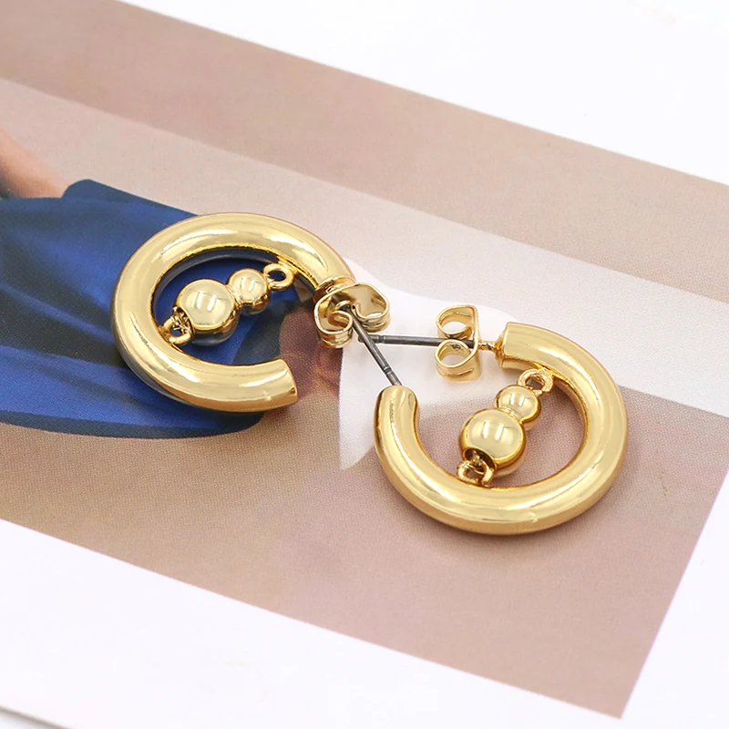 Boucles d'oreilles en forme d'or en laiton en C