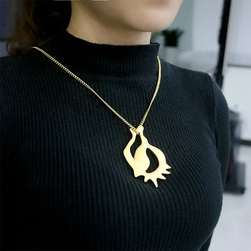 Chaîne de pull pendentif irrégulier