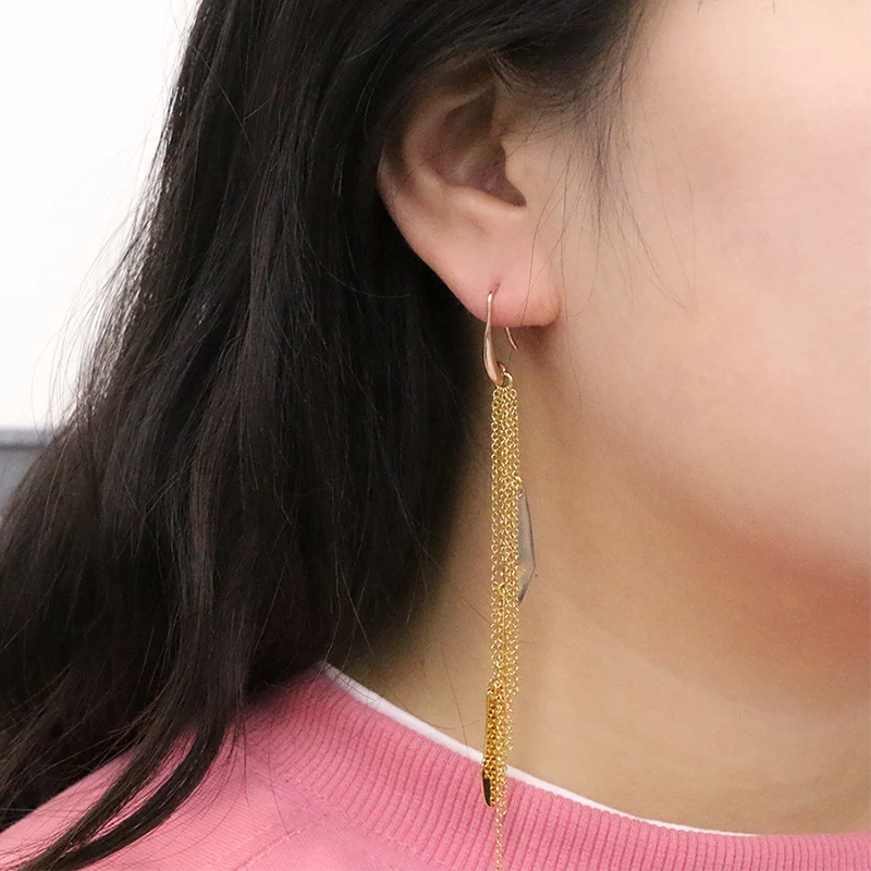 Chaînes de gland et boucles d'oreilles en métal